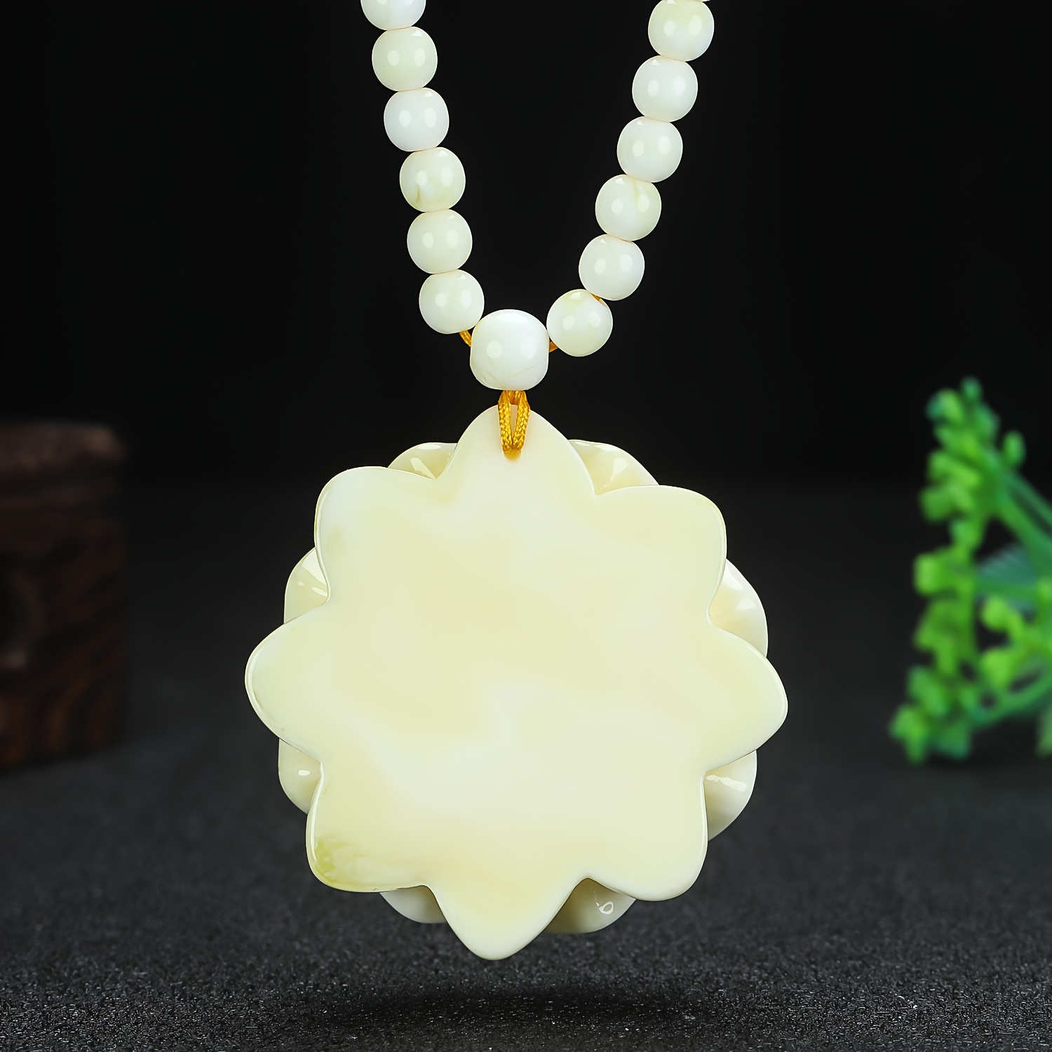 Intricately Carved Elegant Resin Flower Pendant